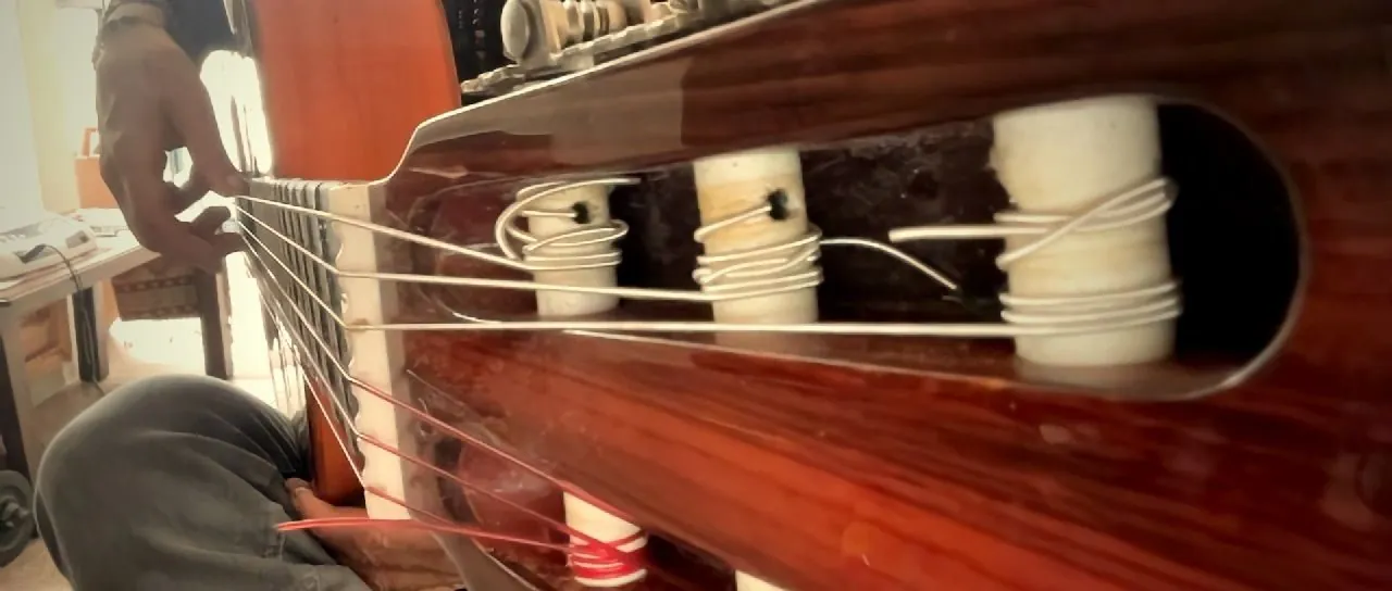 A frame from the site’s guitar film